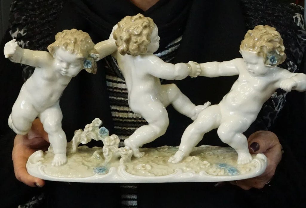 20th Century Porcelain Sculpture with Triptych of Putti by Karl