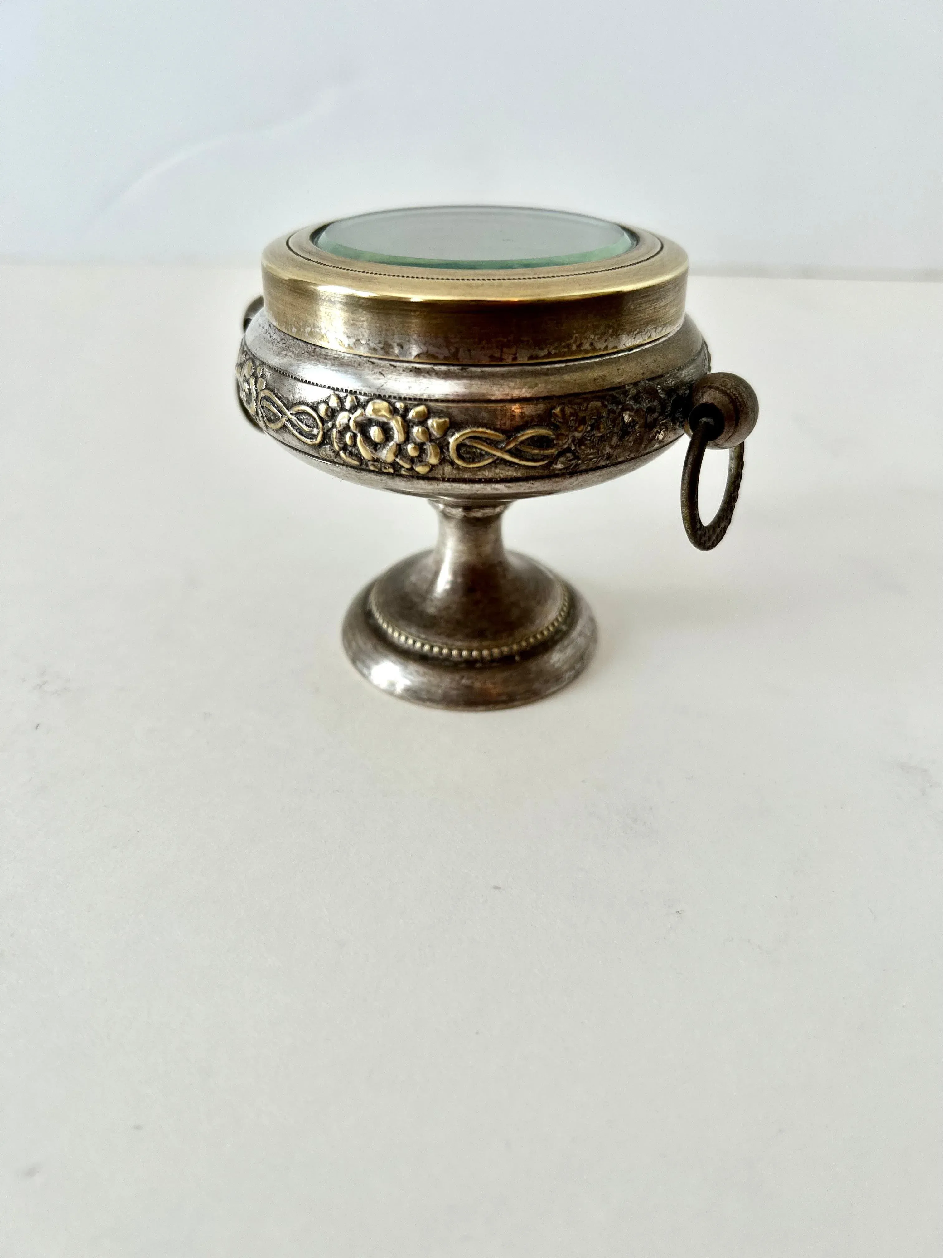 Early 20th Century Repoussé Pedestal Casket Box of Brass & Metal with Glass Lid