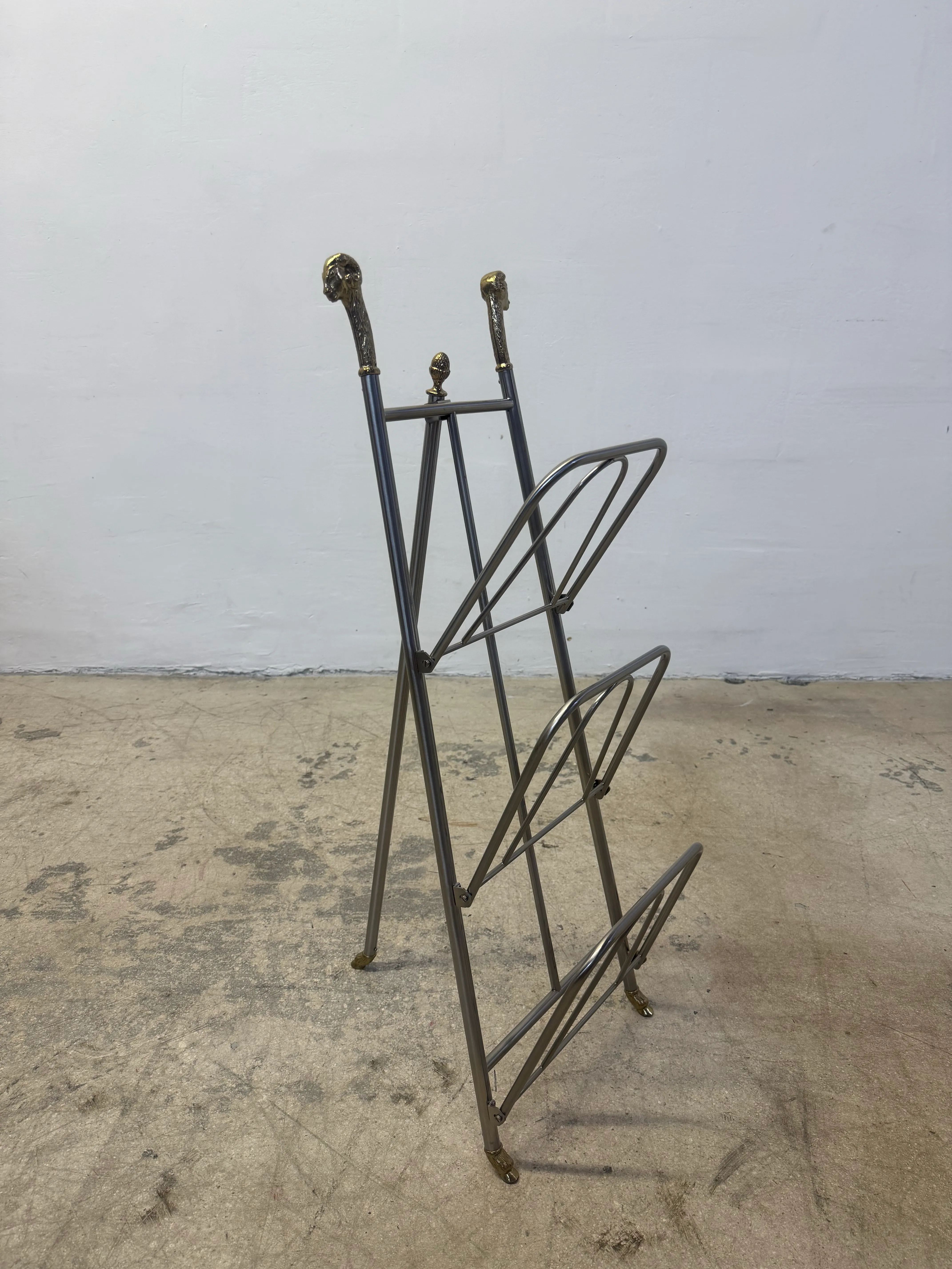 Maison Jansen Style Steel and Brass Rams Head and Feet Magazine Rack, Italy