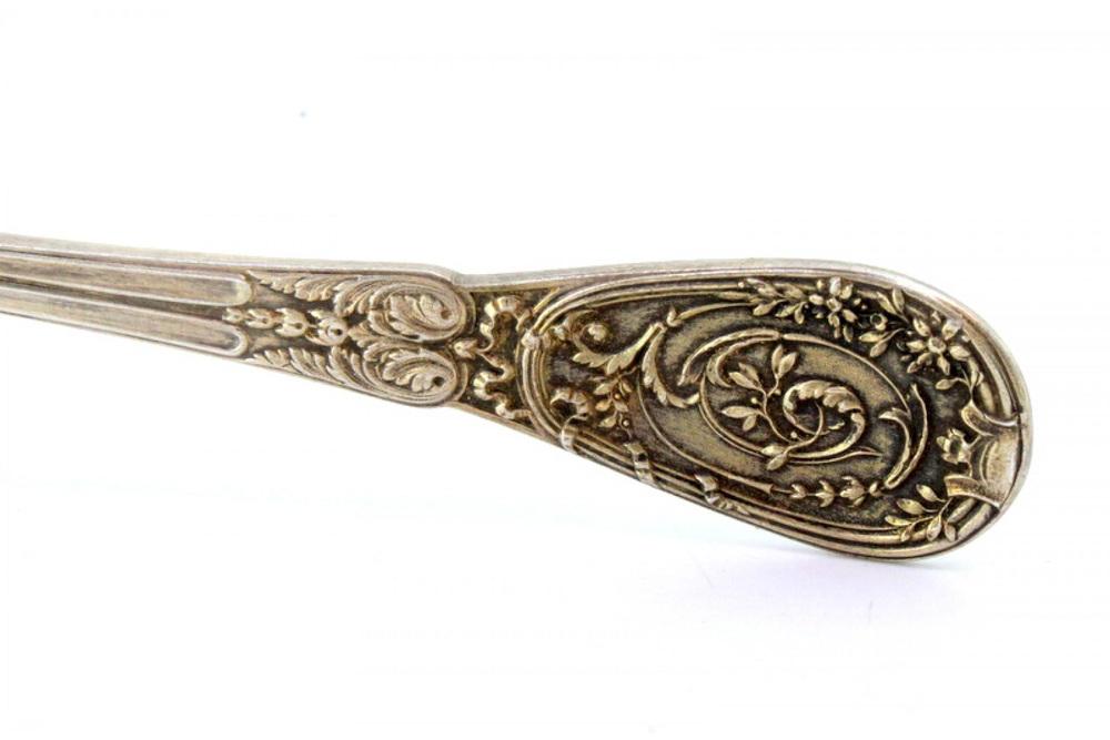 Silver Dusting Spoon with Scalloped Edges and Raised Handle