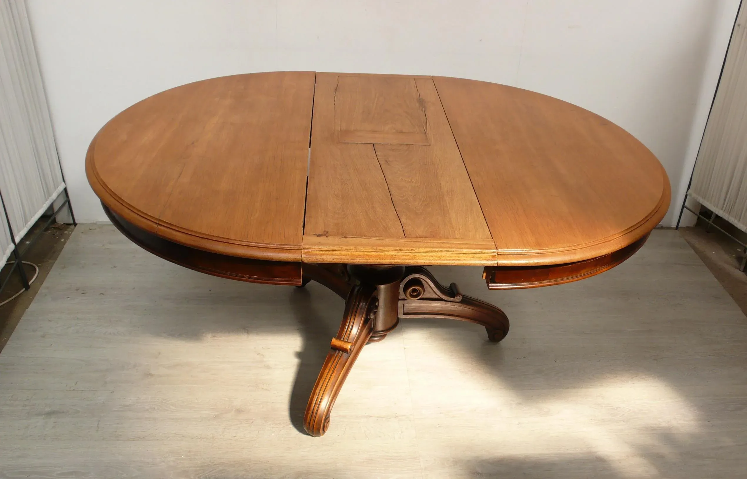 antique-round-dining-table-in-