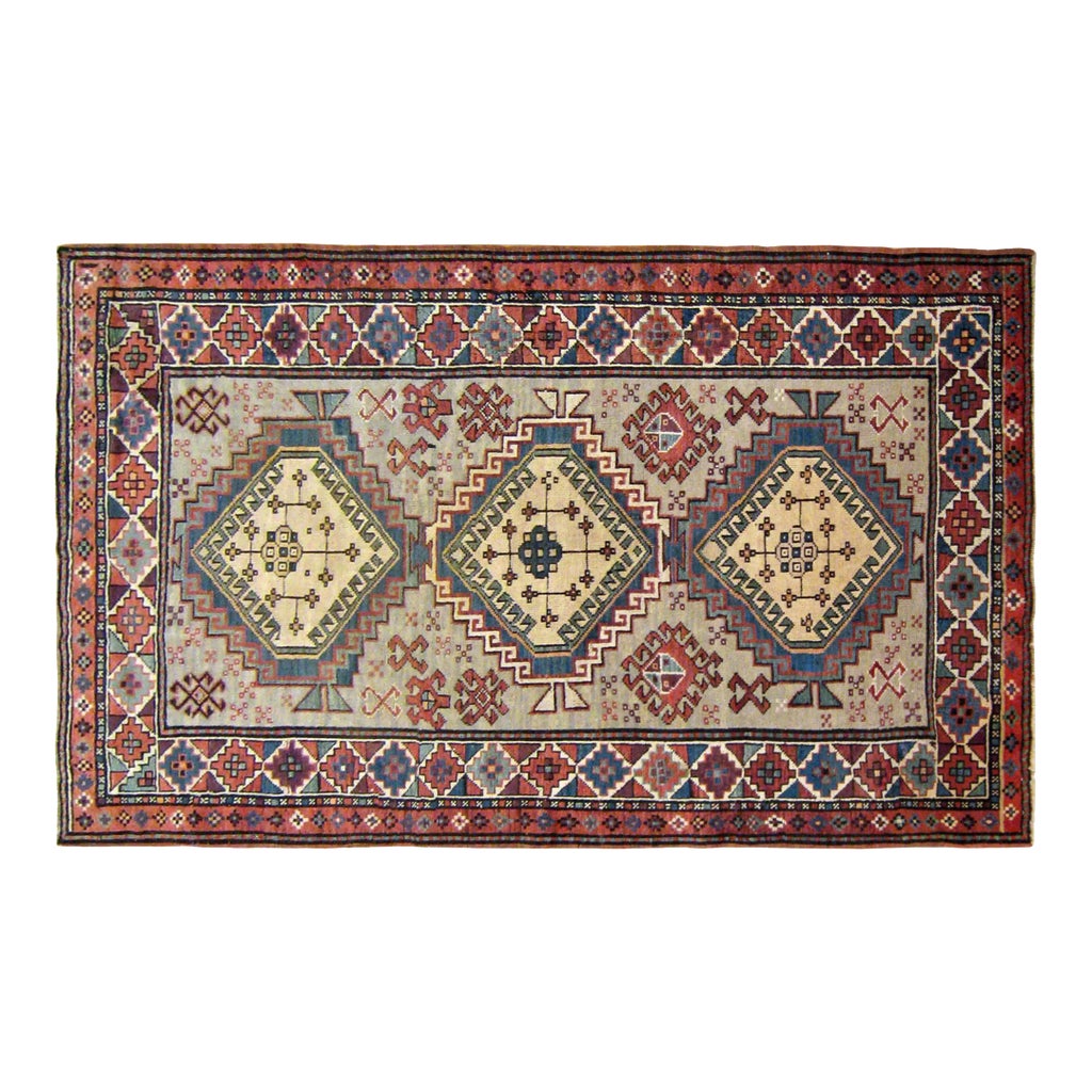 Antique Caucasian Kazak Oriental Rug in Small Size with Three