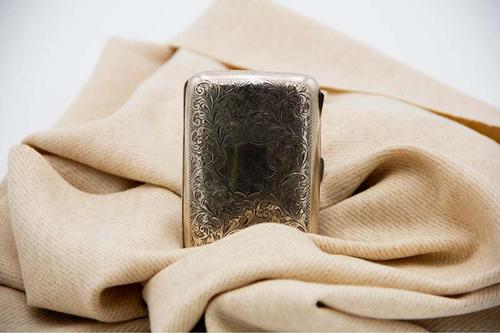 Curved Silver Cigarette Case with Engraved Garlands