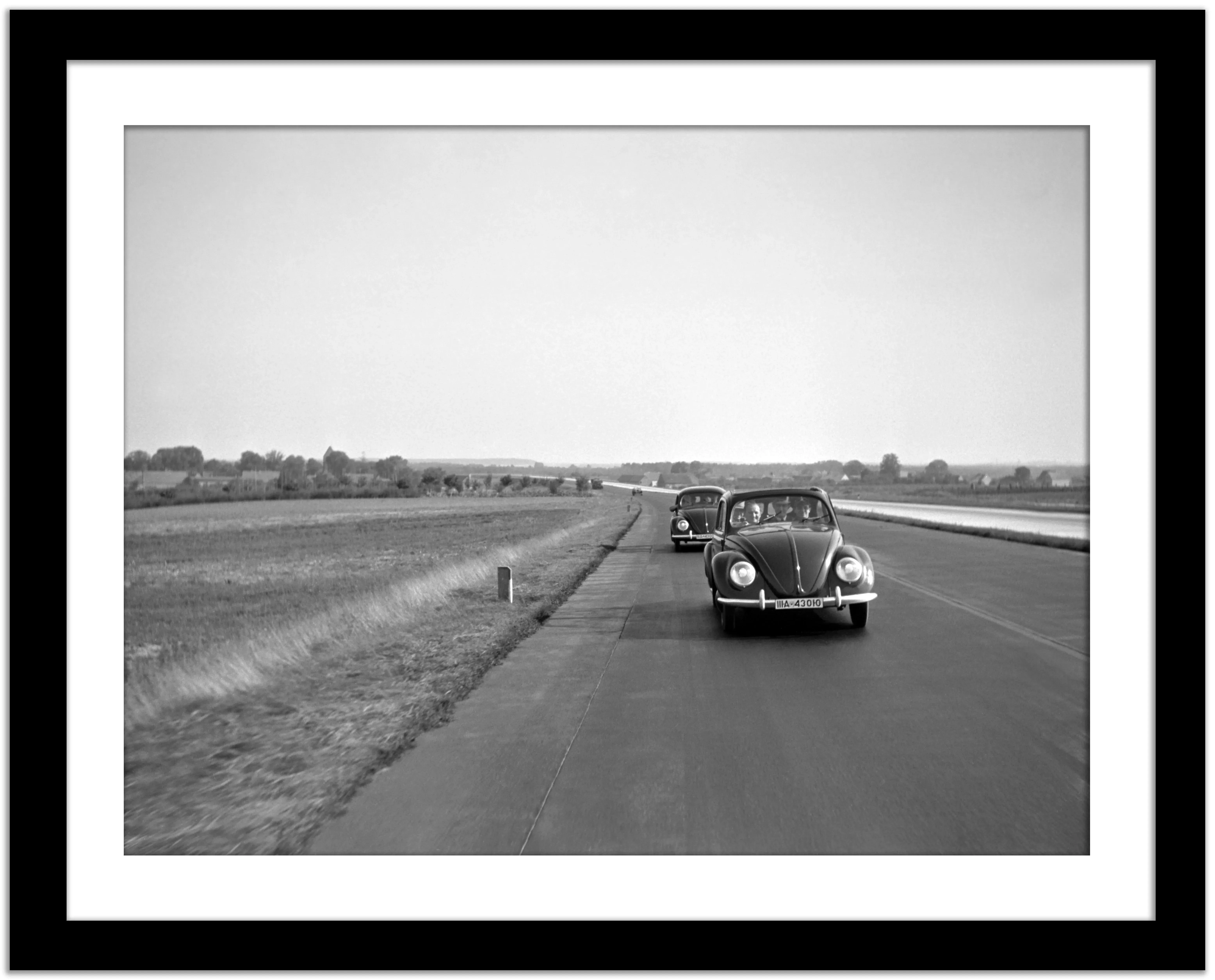Two Volkswagen Beetles on the Highway, Germany, 1938 main image 1