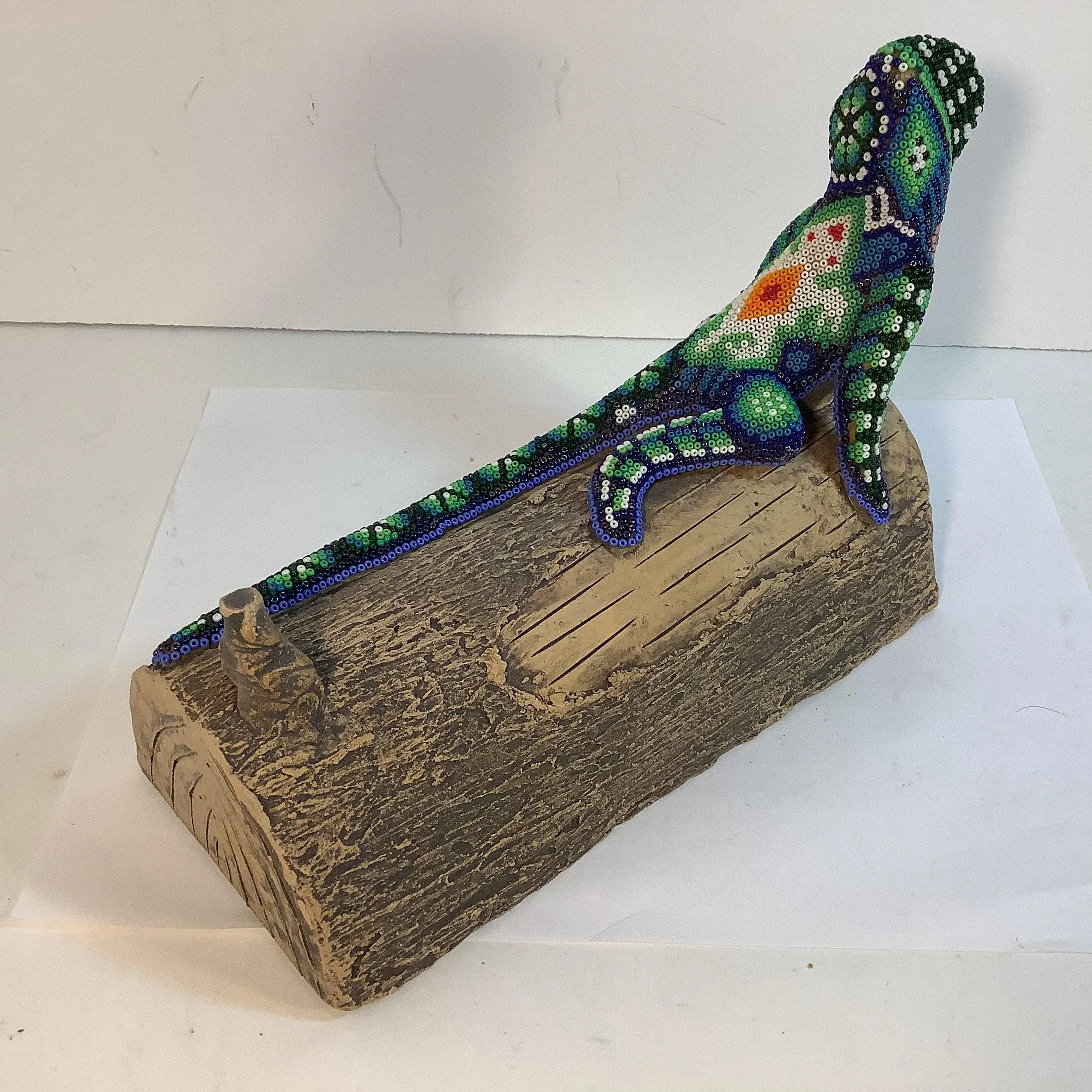 Mid-Century Art Deco Beaded Lizard on a Faux Bois Ceramic Log