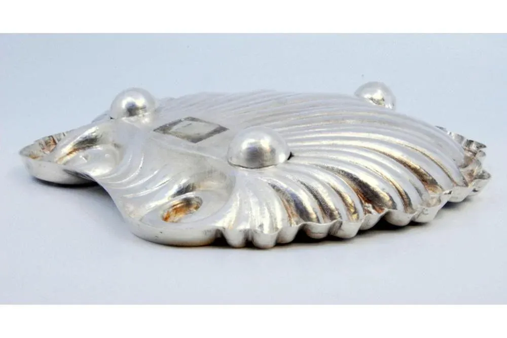 Silver Ticket Booth in the Shape of a Shell