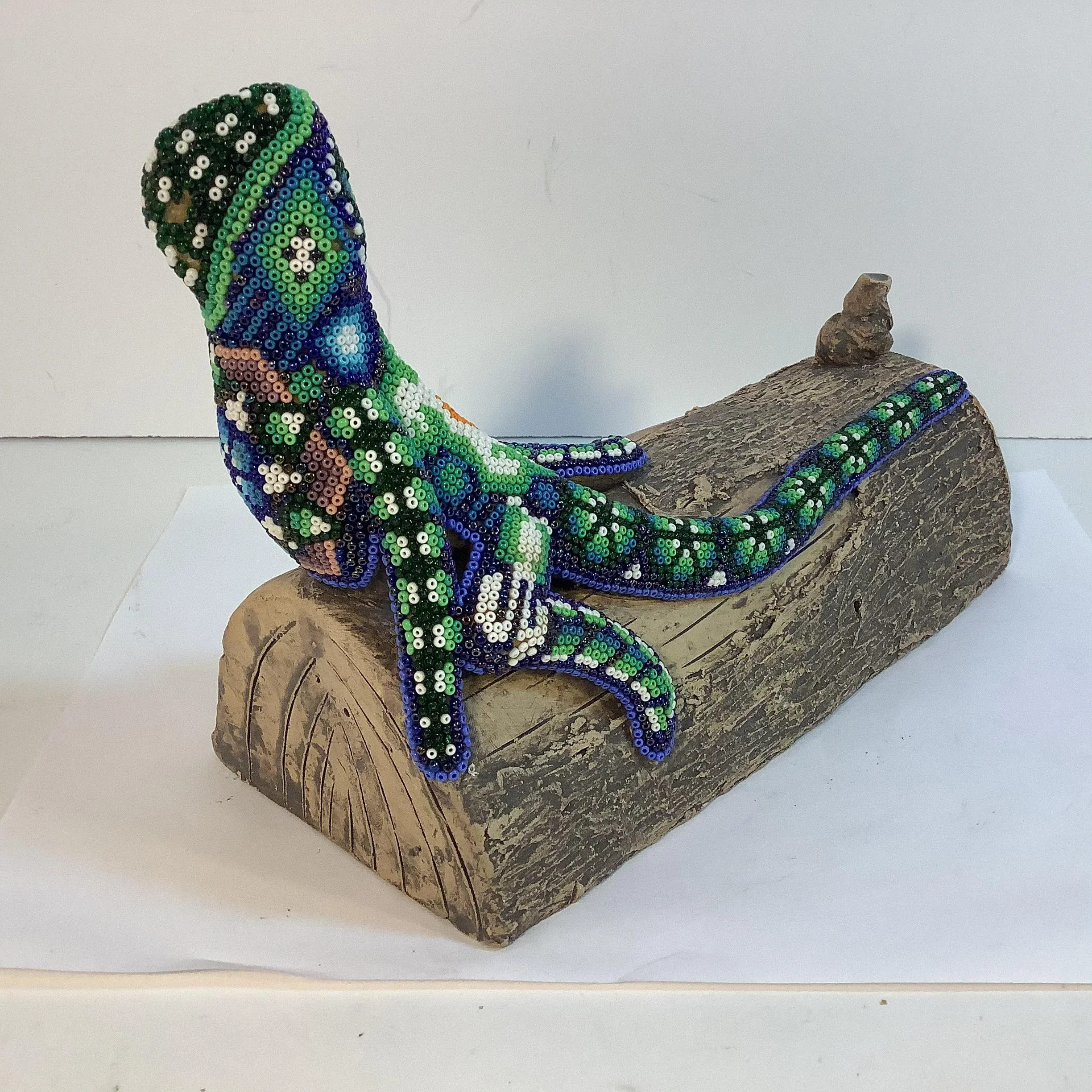Mid-Century Art Deco Beaded Lizard on a Faux Bois Ceramic Log