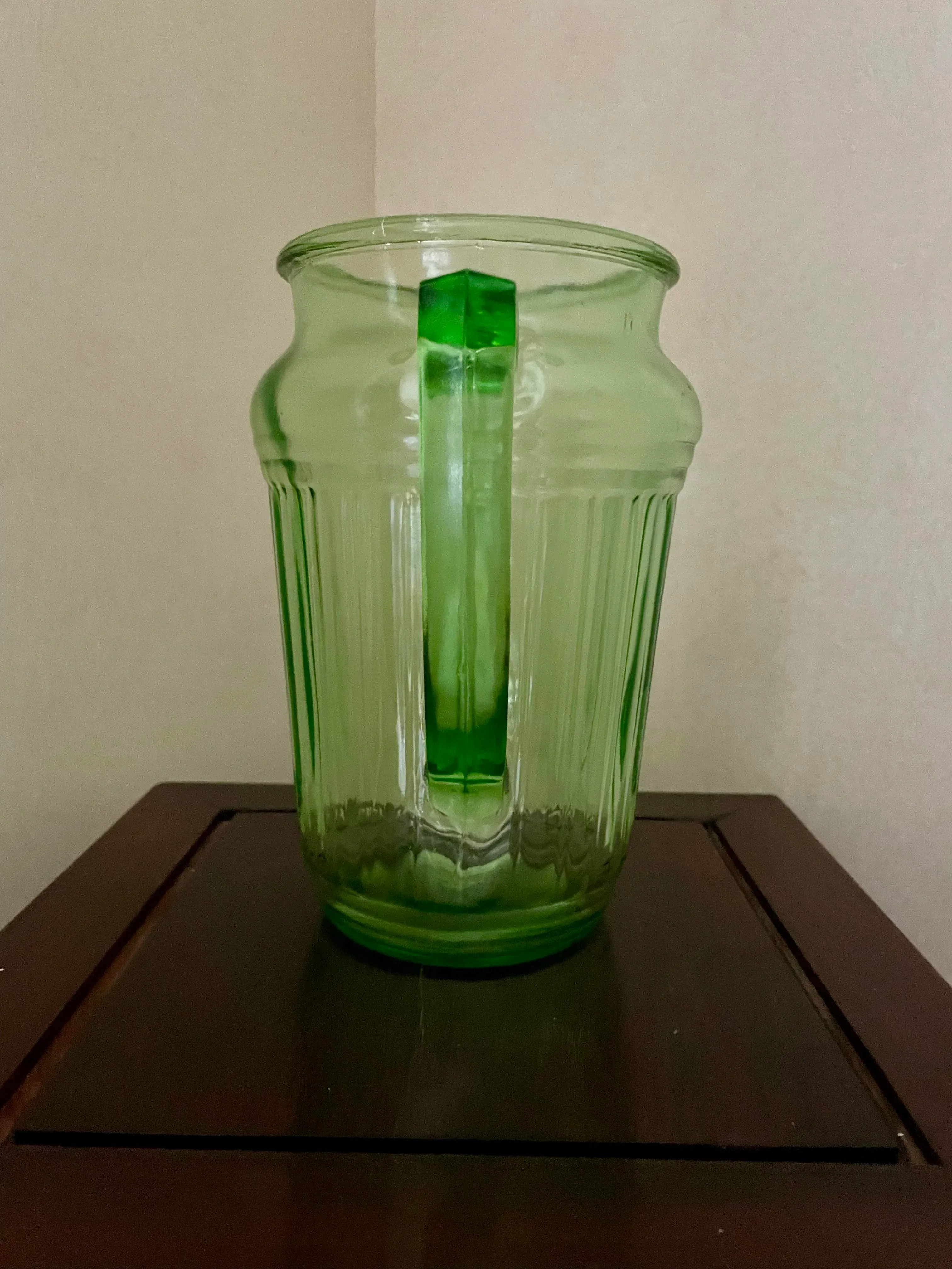 Set of Green Glass Pitcher and Two Canasters