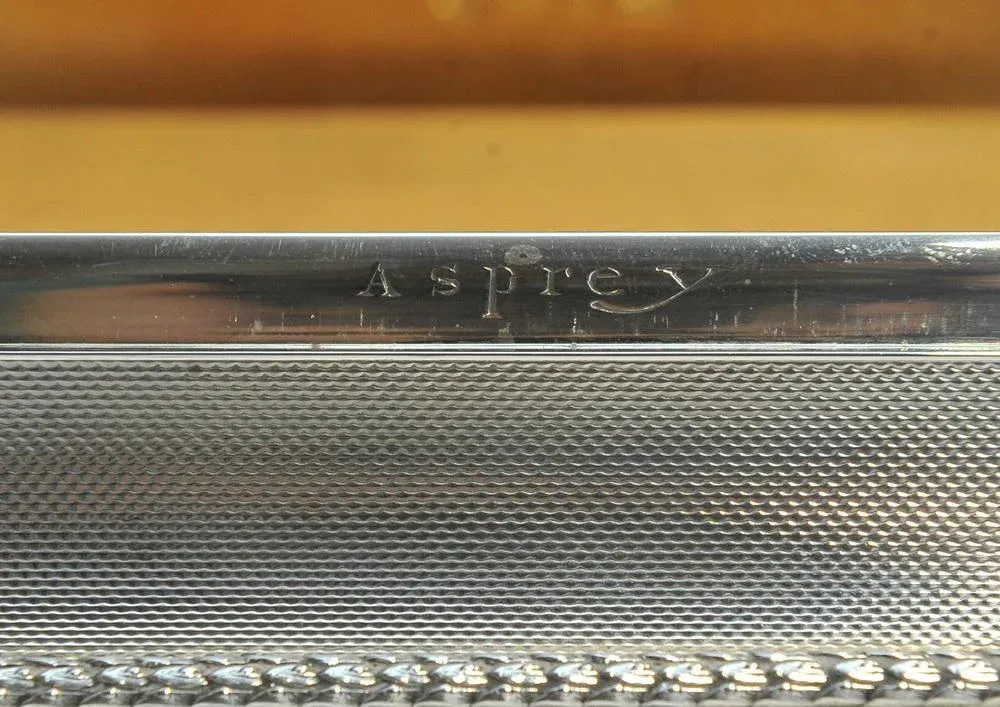 asprey silver cigarette case George VI Case. London 1945 & Co. Ltd. 6.8 tro  Bassetlaw Silver & Antiques The Barley Pattern Card Case is handcrafted in sterling silver Asprey & Co Sterling Silver