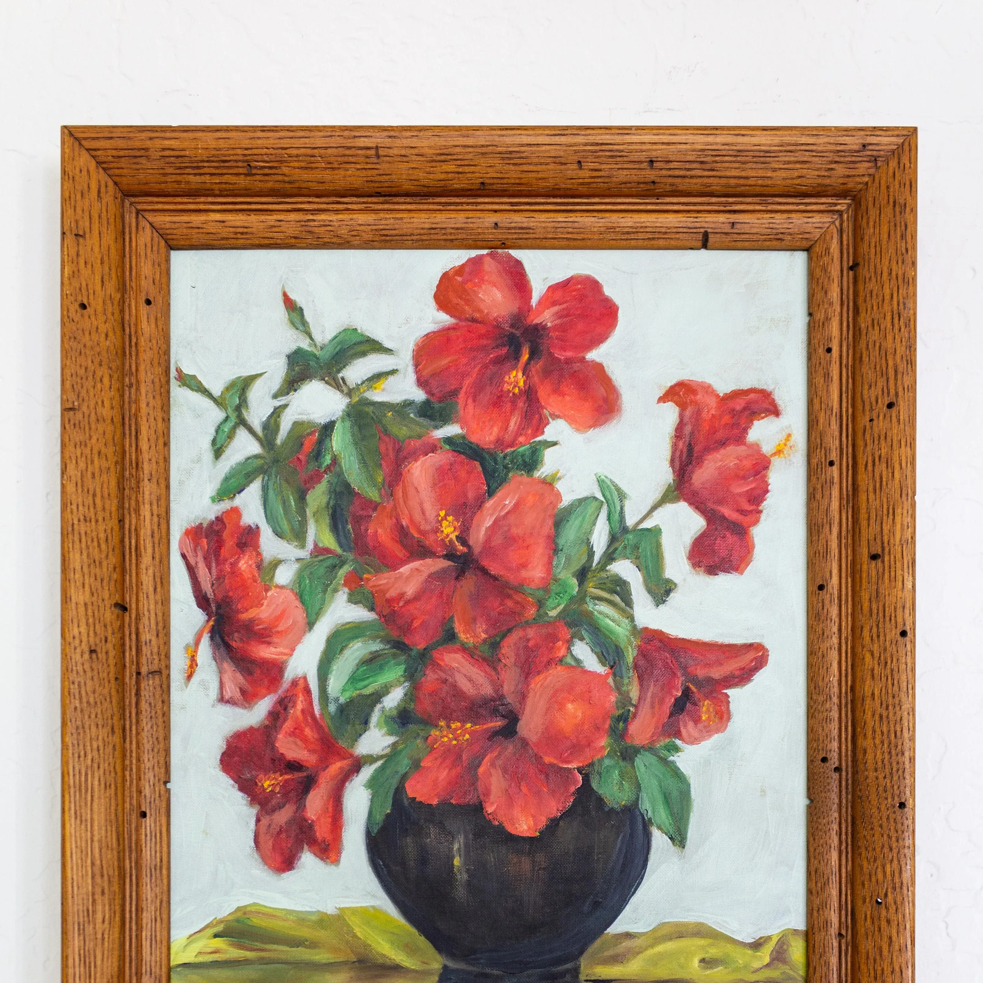 red-hibiscus-flowers-in-a-vase