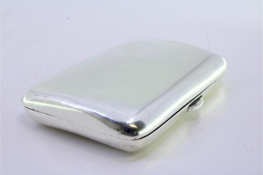 Curved Silver Cigarette Case with Spring-Loaded Hinged Lid