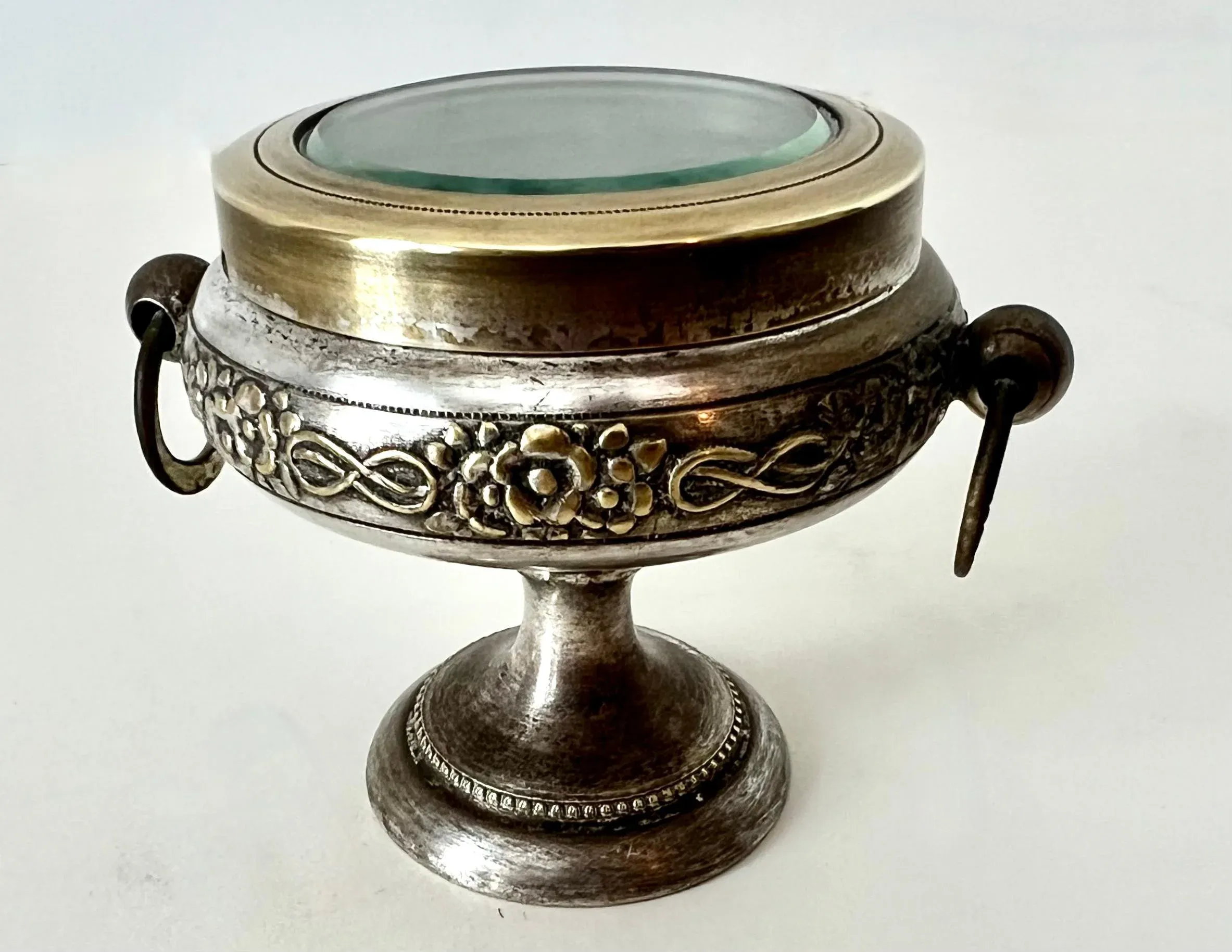 Early 20th Century Repoussé Pedestal Casket Box of Brass & Metal with Glass Lid