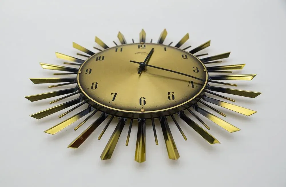 Mid-Century Modern Sunburst Wall Clock from Condor, 1950s