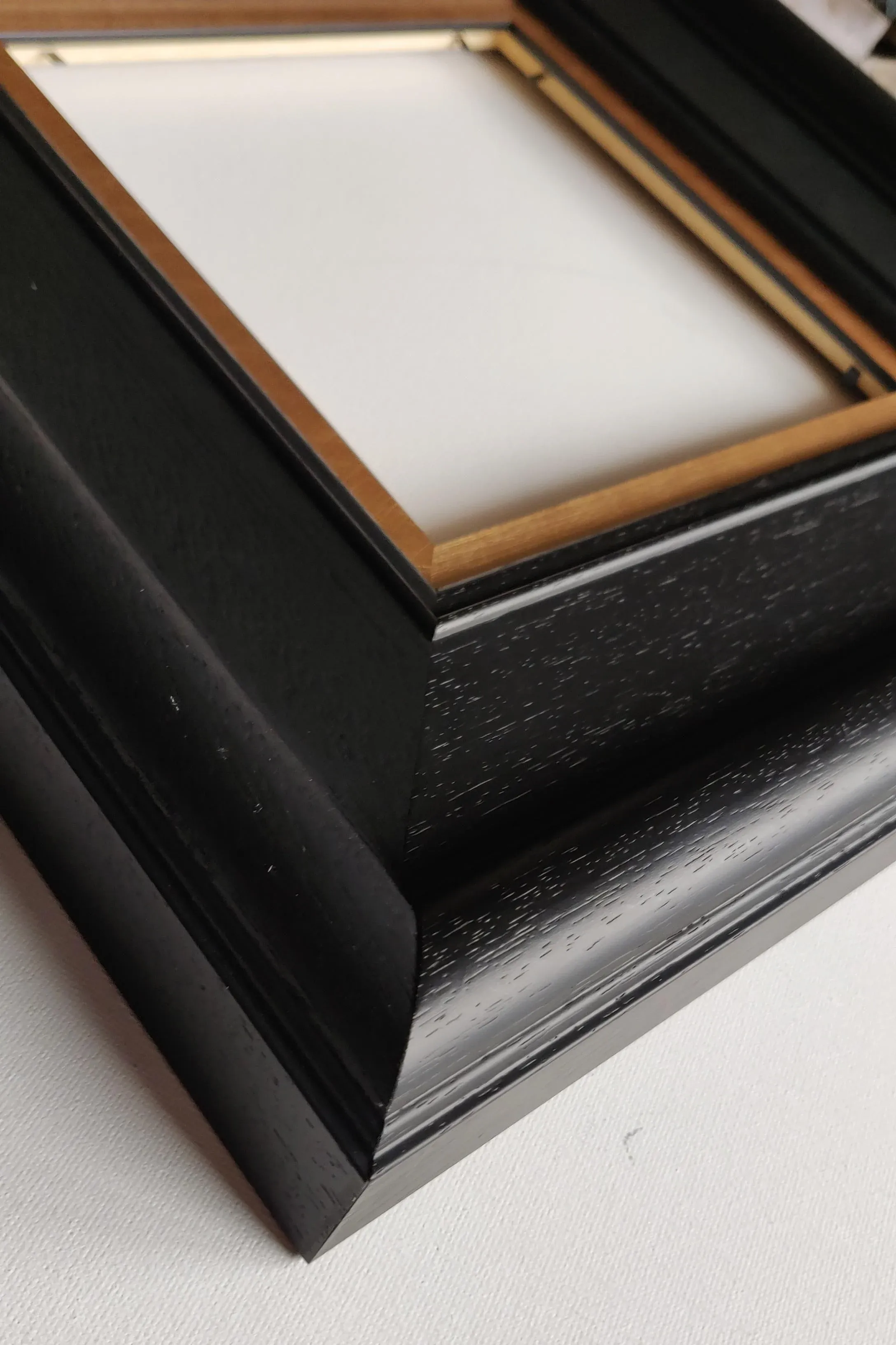 Black Wooden Frame Gold Slip Detail