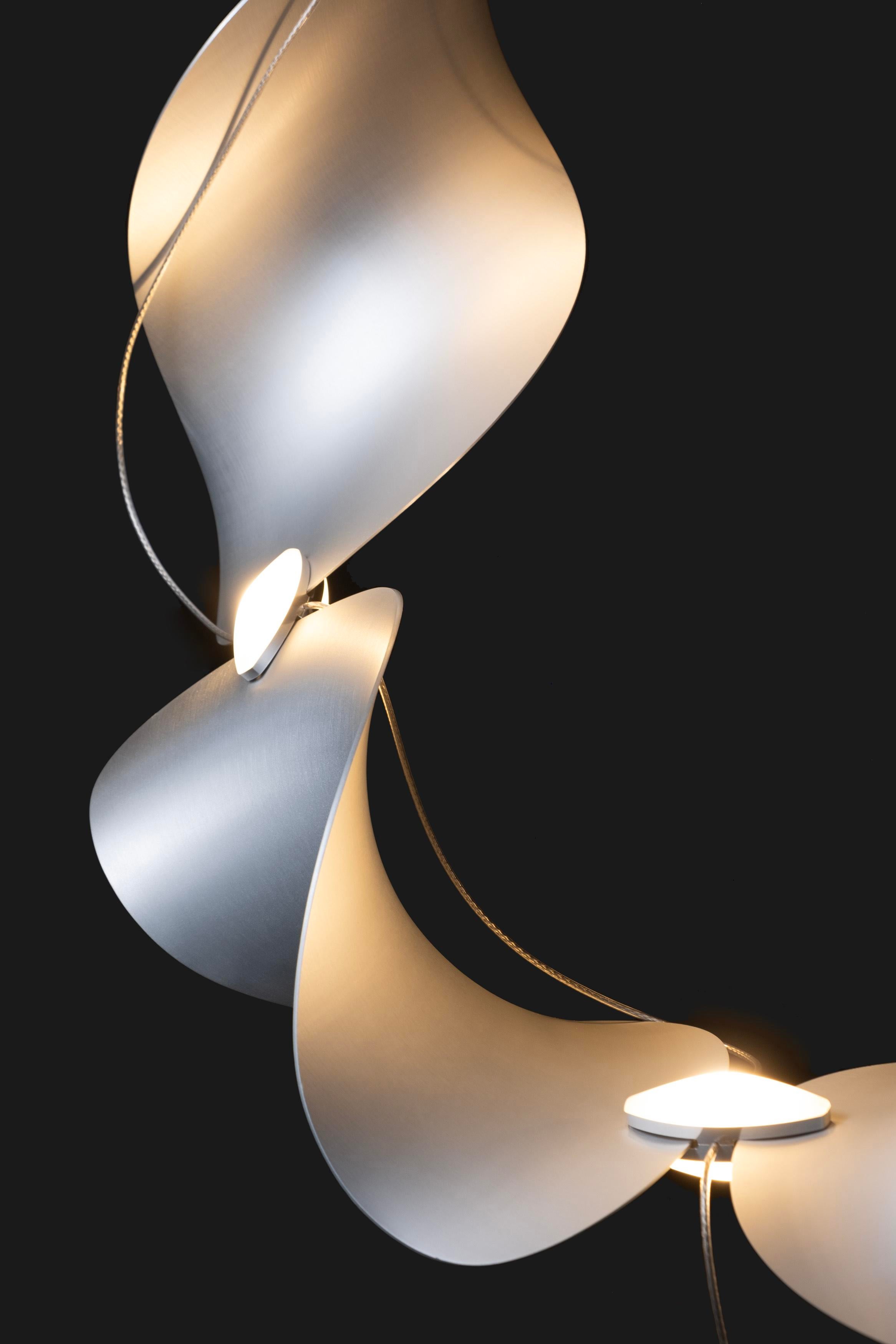 Dune 8 Curve Chandelier with Silver Anodized Shades by Daniel Becker Moss Objects