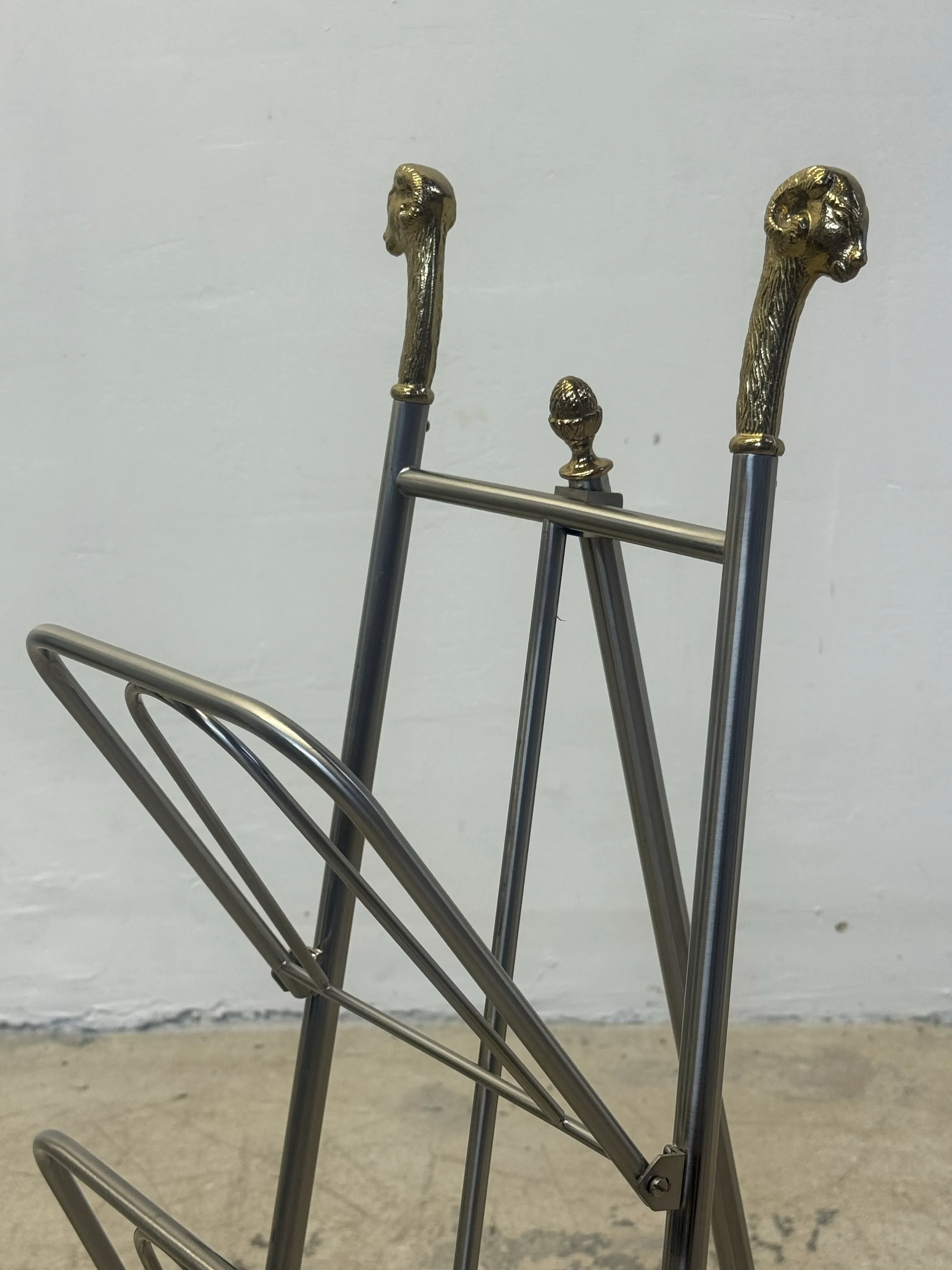 Maison Jansen Style Steel and Brass Rams Head and Feet Magazine Rack, Italy