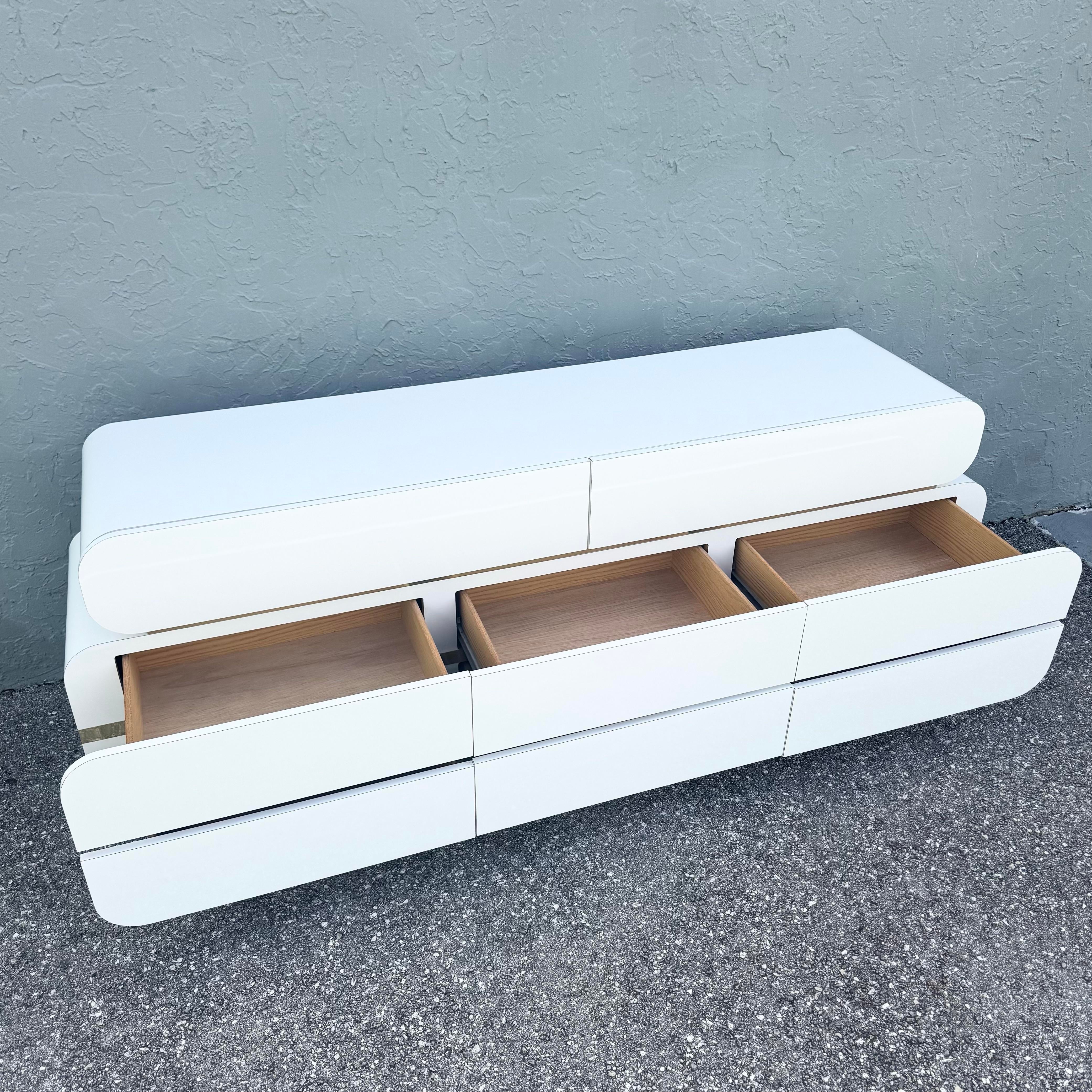 Postmodern Galactic White Gloss Laminate Waterfall Dresser With Gold Accents