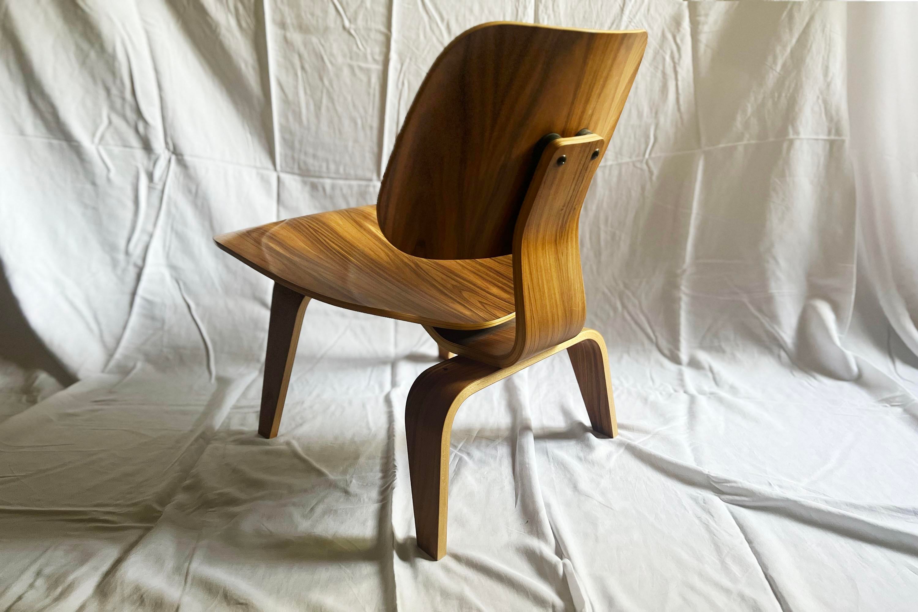 2000s Eames Molded Plywood Lounge Potato Chip Chair Chairish
