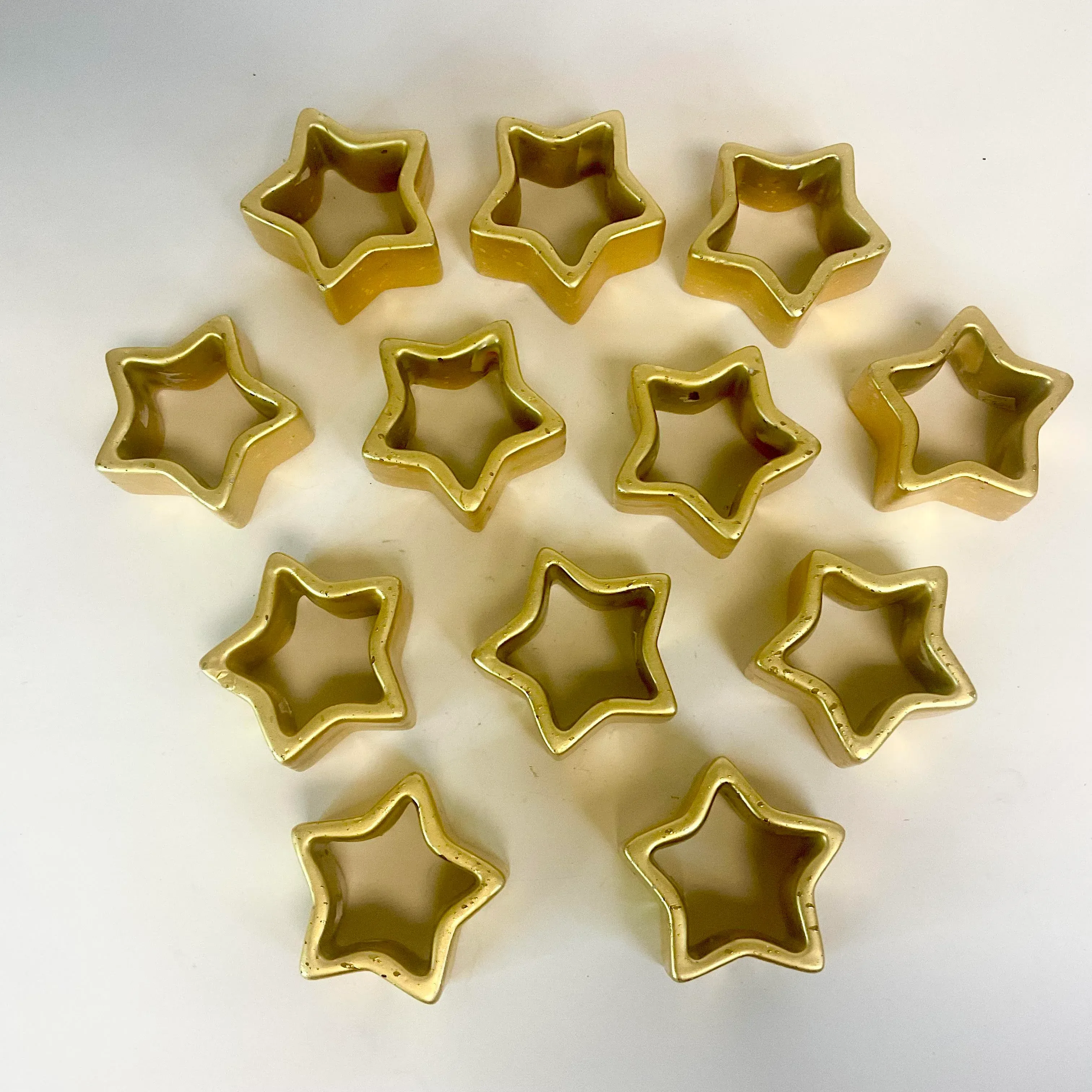 1980s Postmodern Hollywood Regency Ceramic Star Napkin Rings - Set of 12