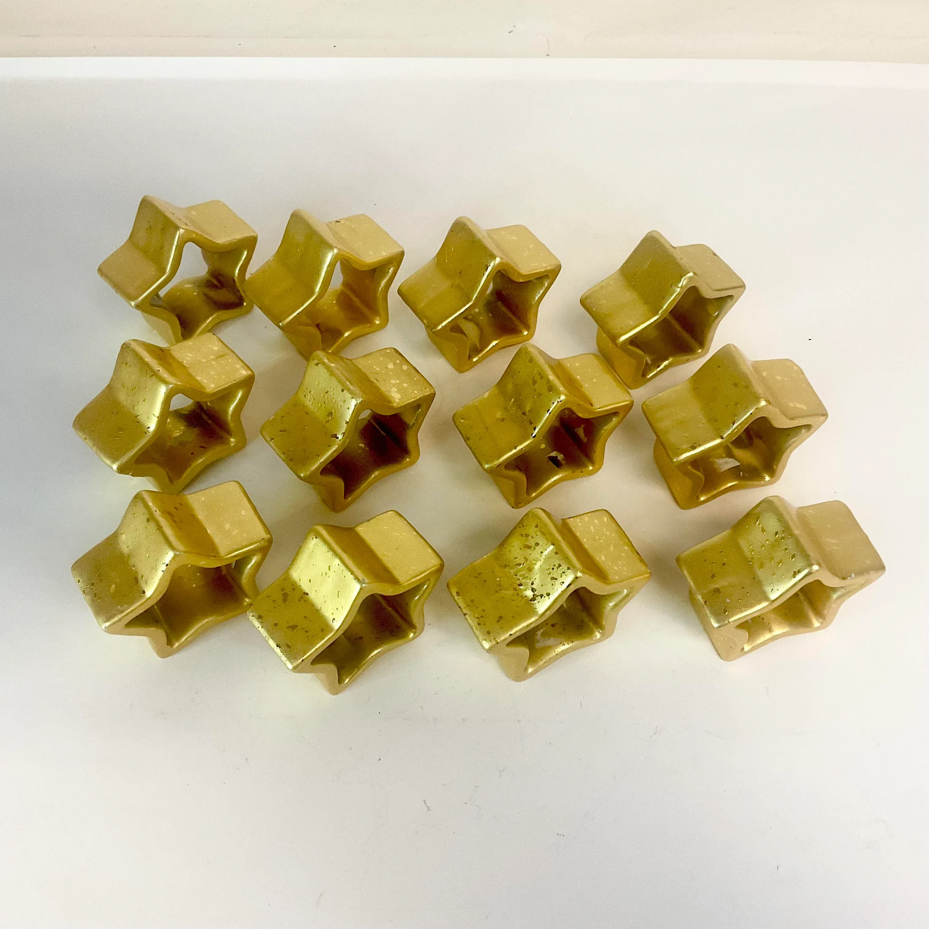 1980s Postmodern Hollywood Regency Ceramic Star Napkin Rings - Set of 12