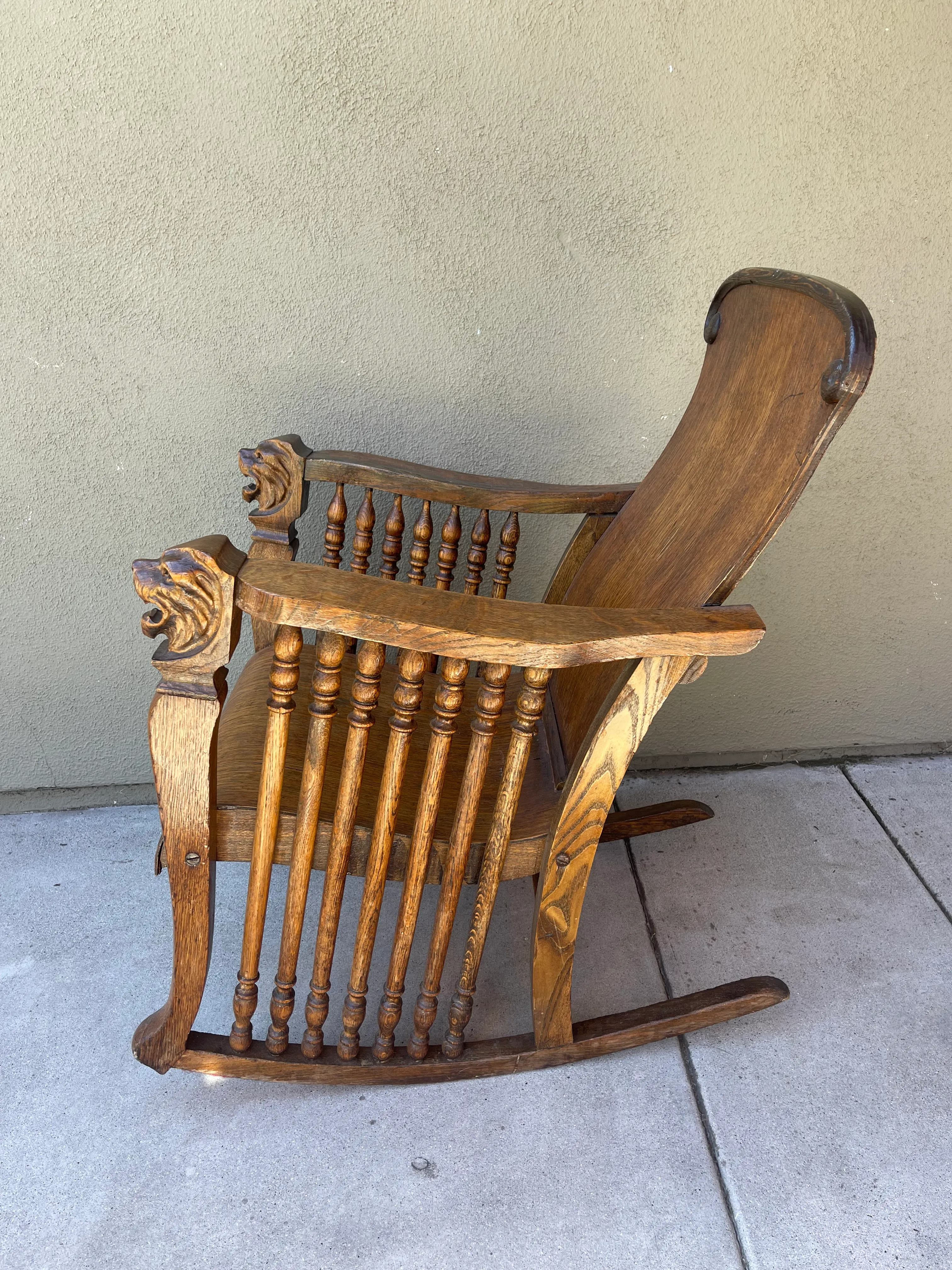 Antique rocking chair with lion head arms hotsell