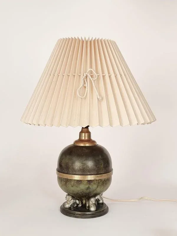 Swedish Grace Metal Table Lamp with Lions Decor from Svenska Metallverken, 1920s