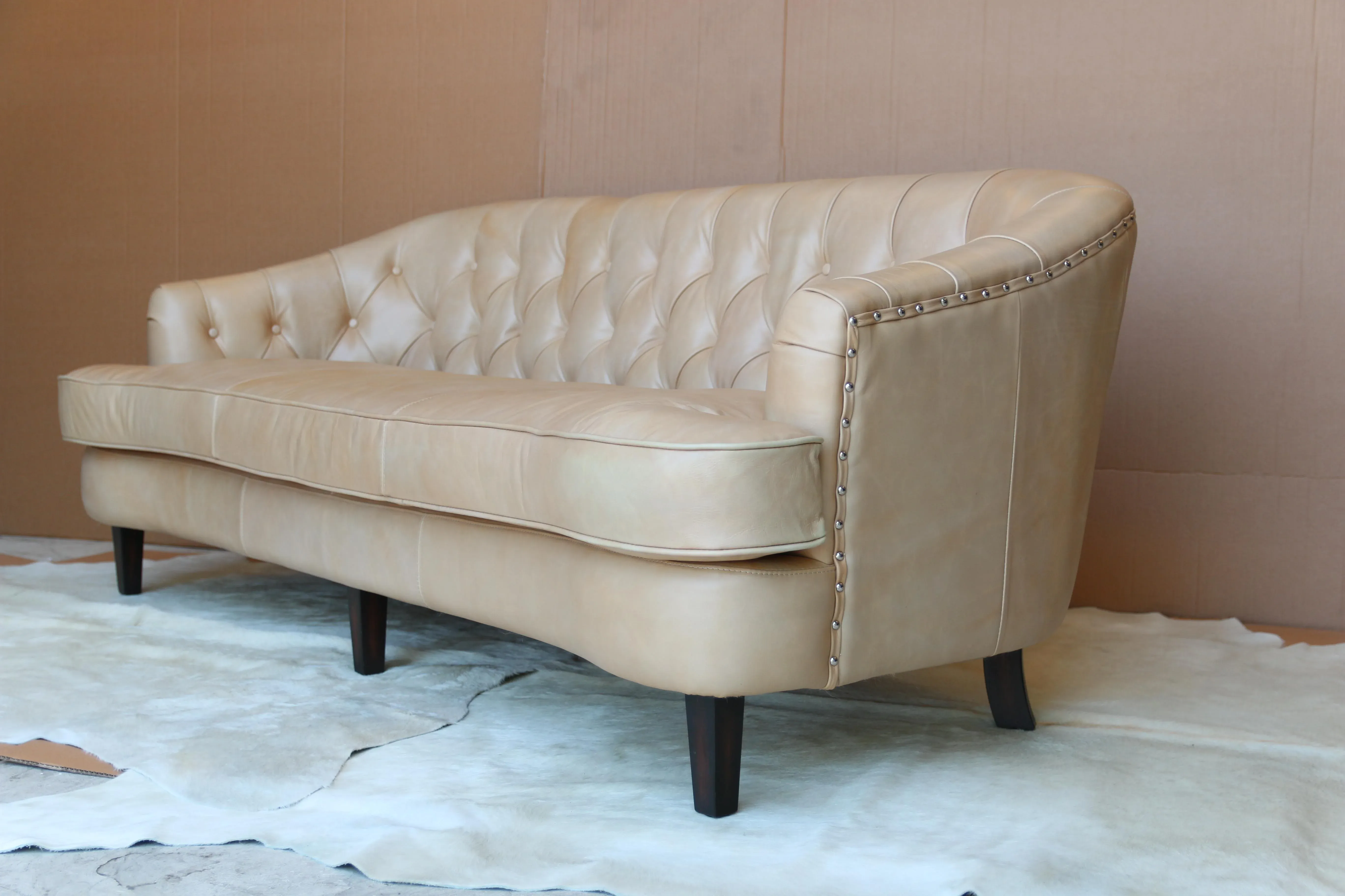 Curved Leather Sofa in Gaston