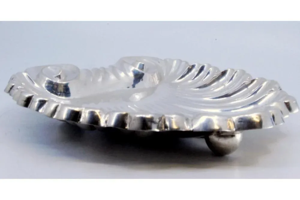 Silver Ticket Booth in the Shape of a Shell