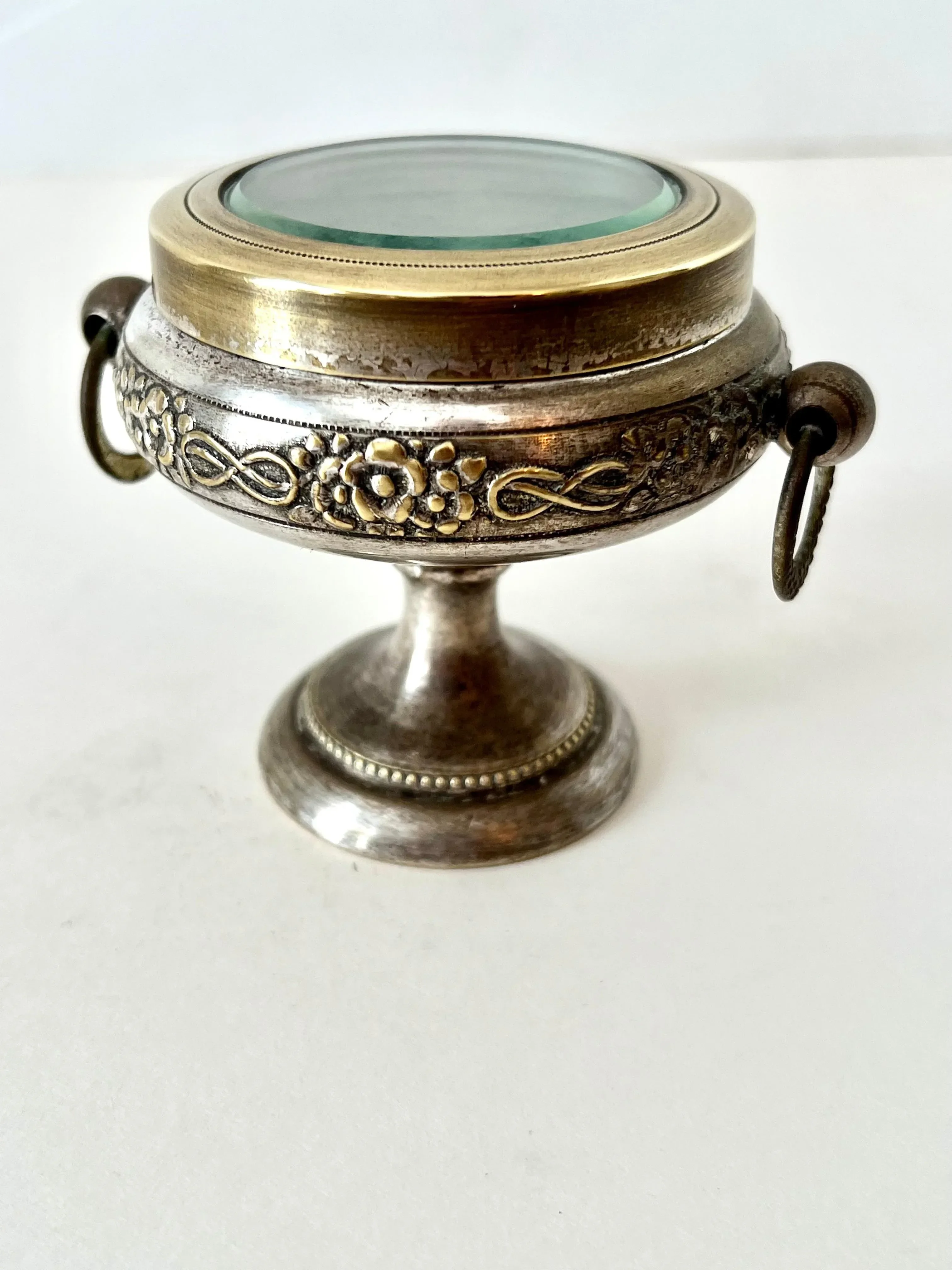 Early 20th Century Repoussé Pedestal Casket Box of Brass & Metal with Glass Lid