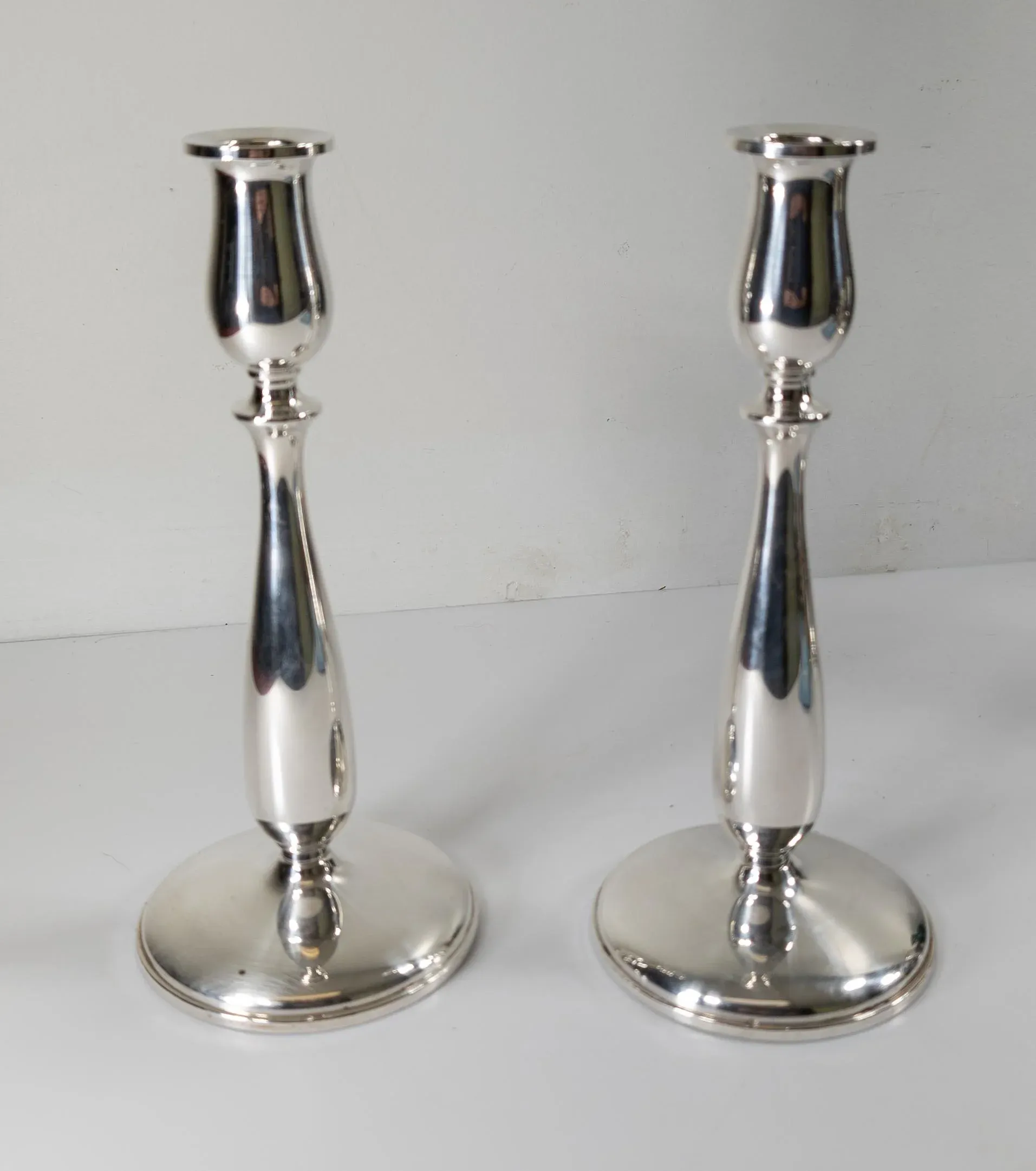 Mid-Century Pair of Cartier Sterling Silver Weighted Candlesticks