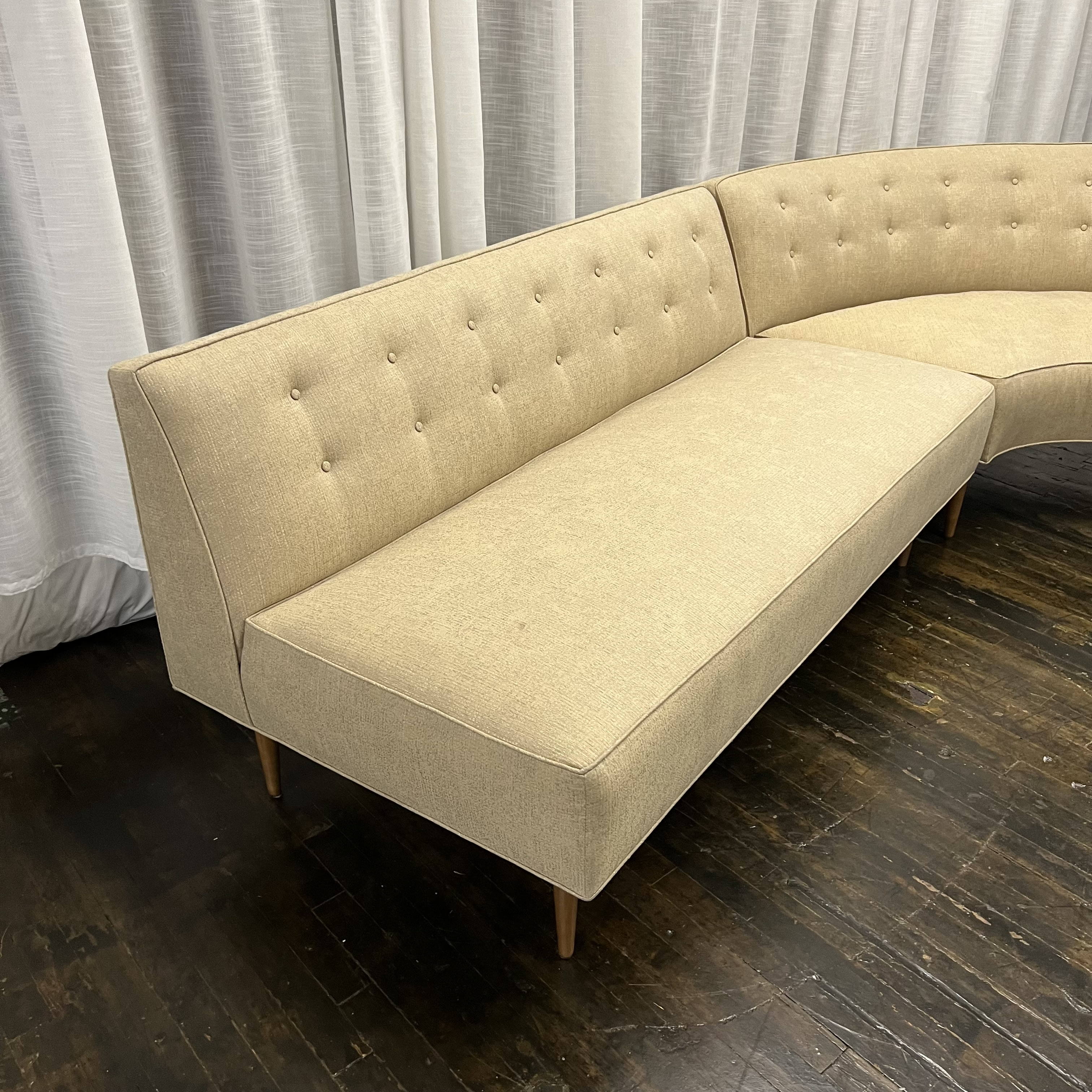 Curved mid clearance century sectional