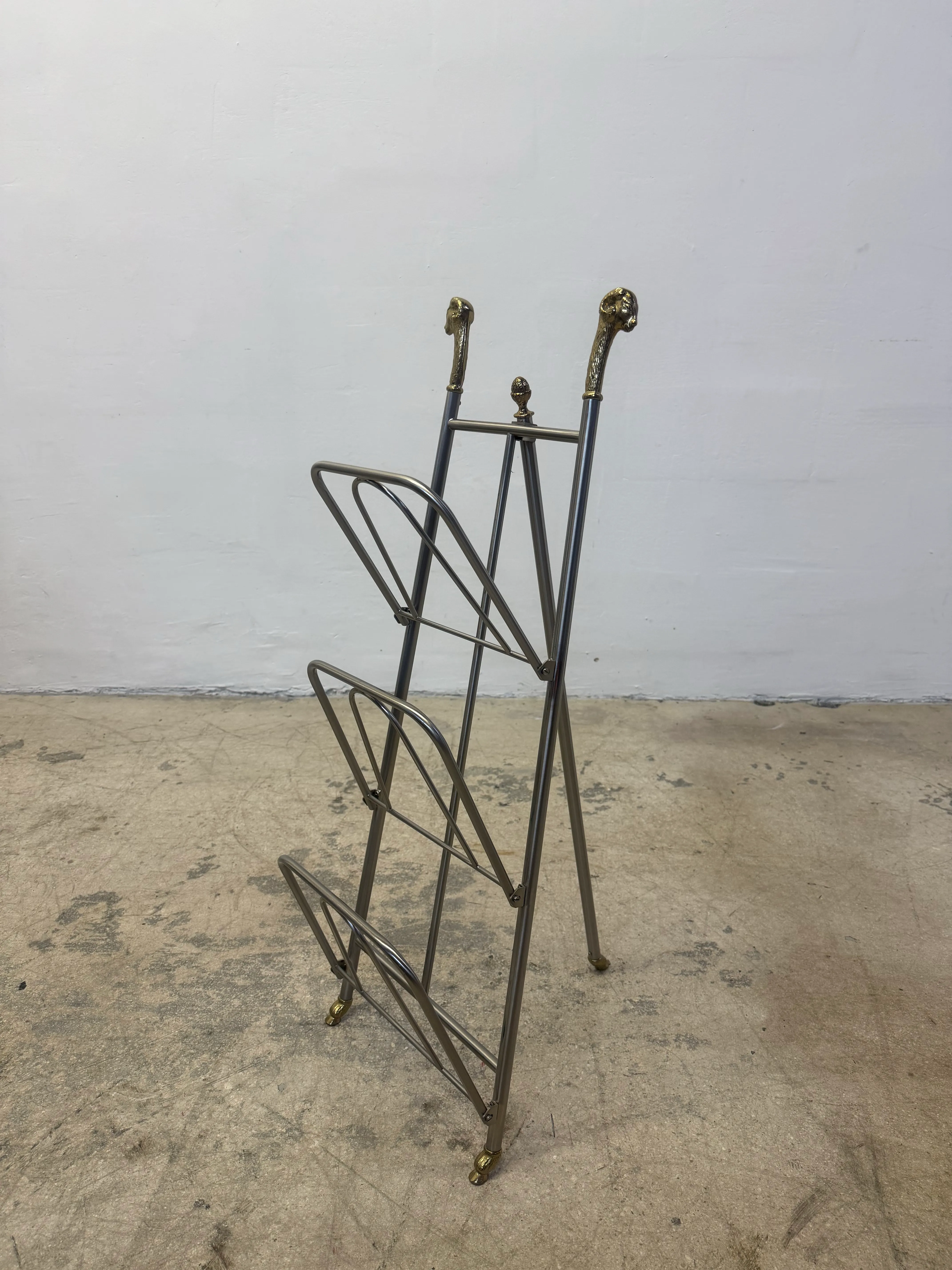 Maison Jansen Style Steel and Brass Rams Head and Feet Magazine Rack, Italy