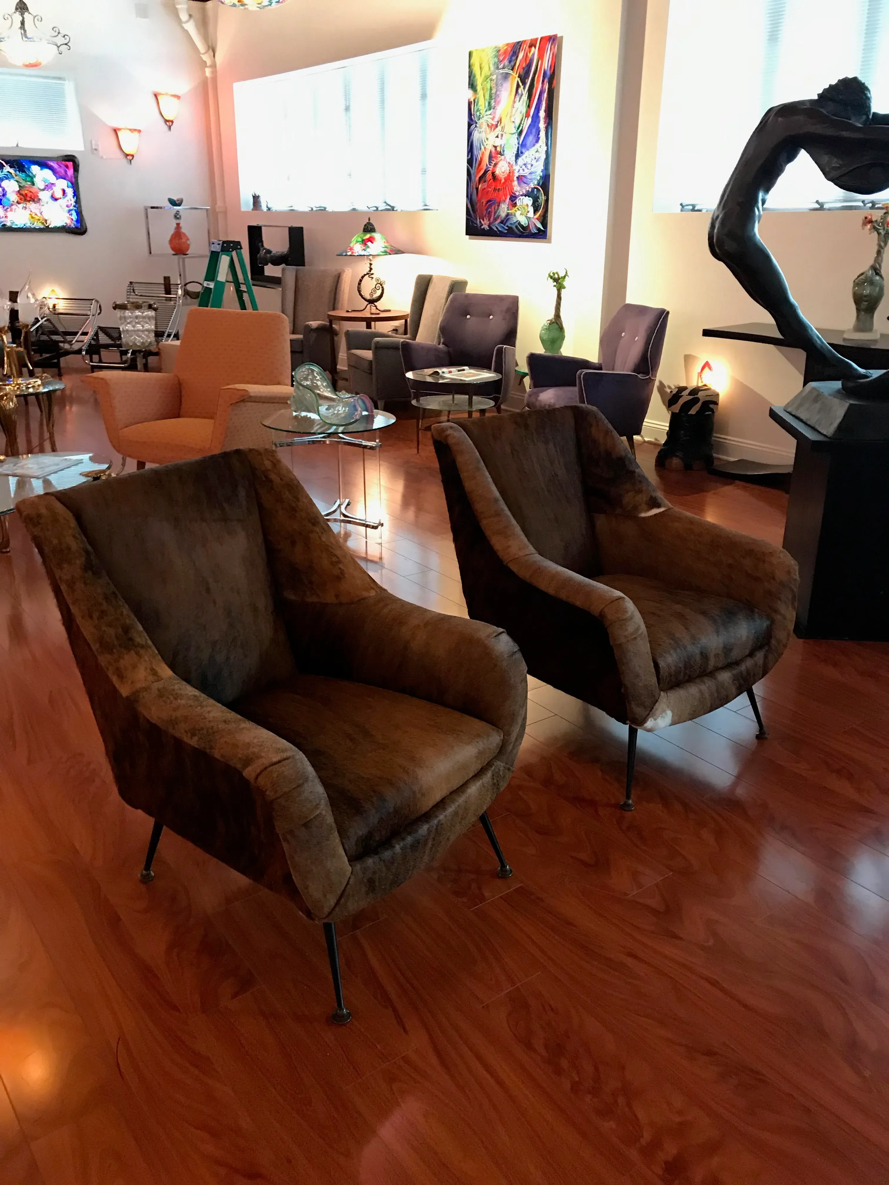 Italian Mid-Century Modern Club Chairs Covered in Cowhide a Pair