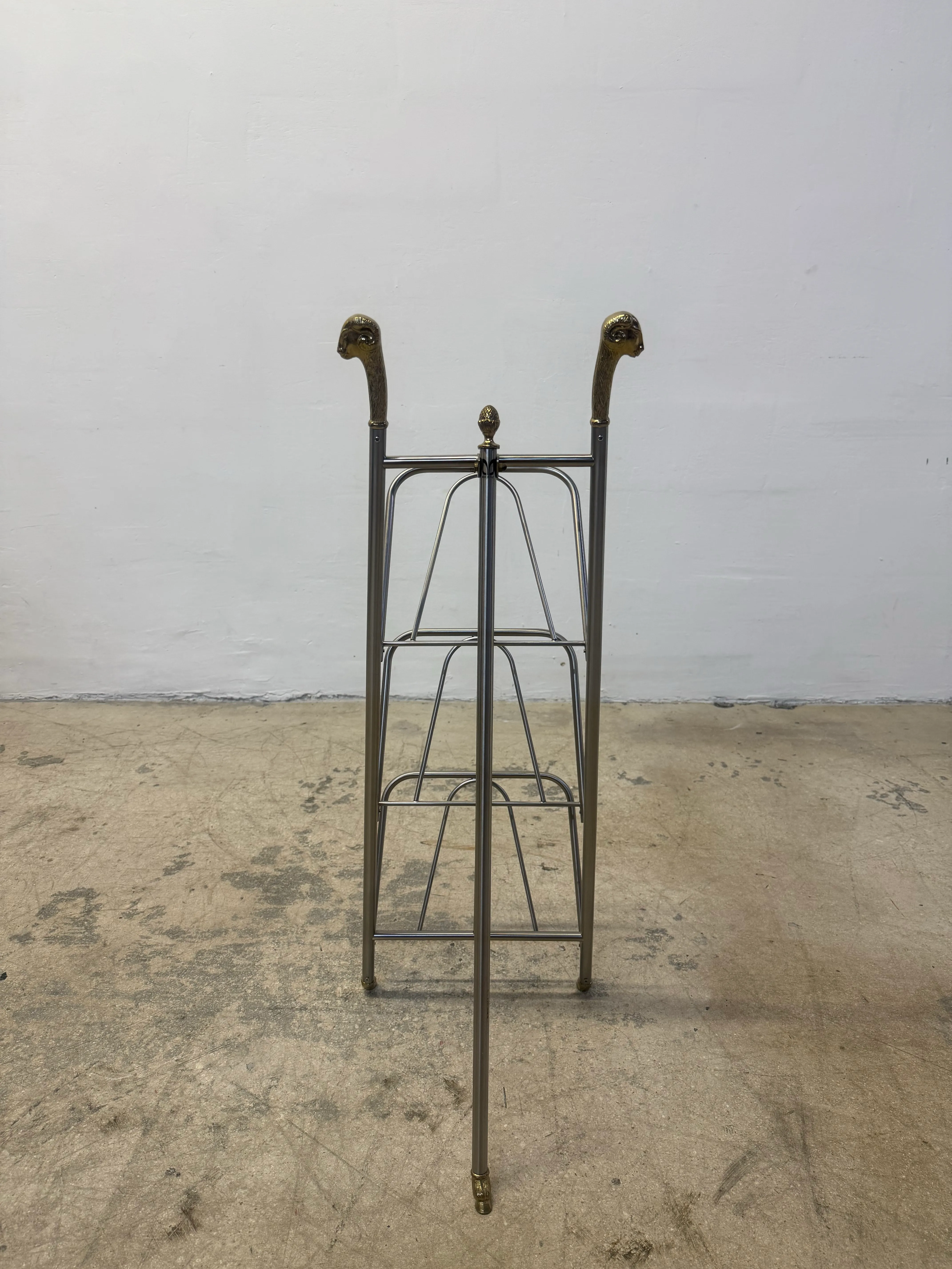 Maison Jansen Style Steel and Brass Rams Head and Feet Magazine Rack, Italy