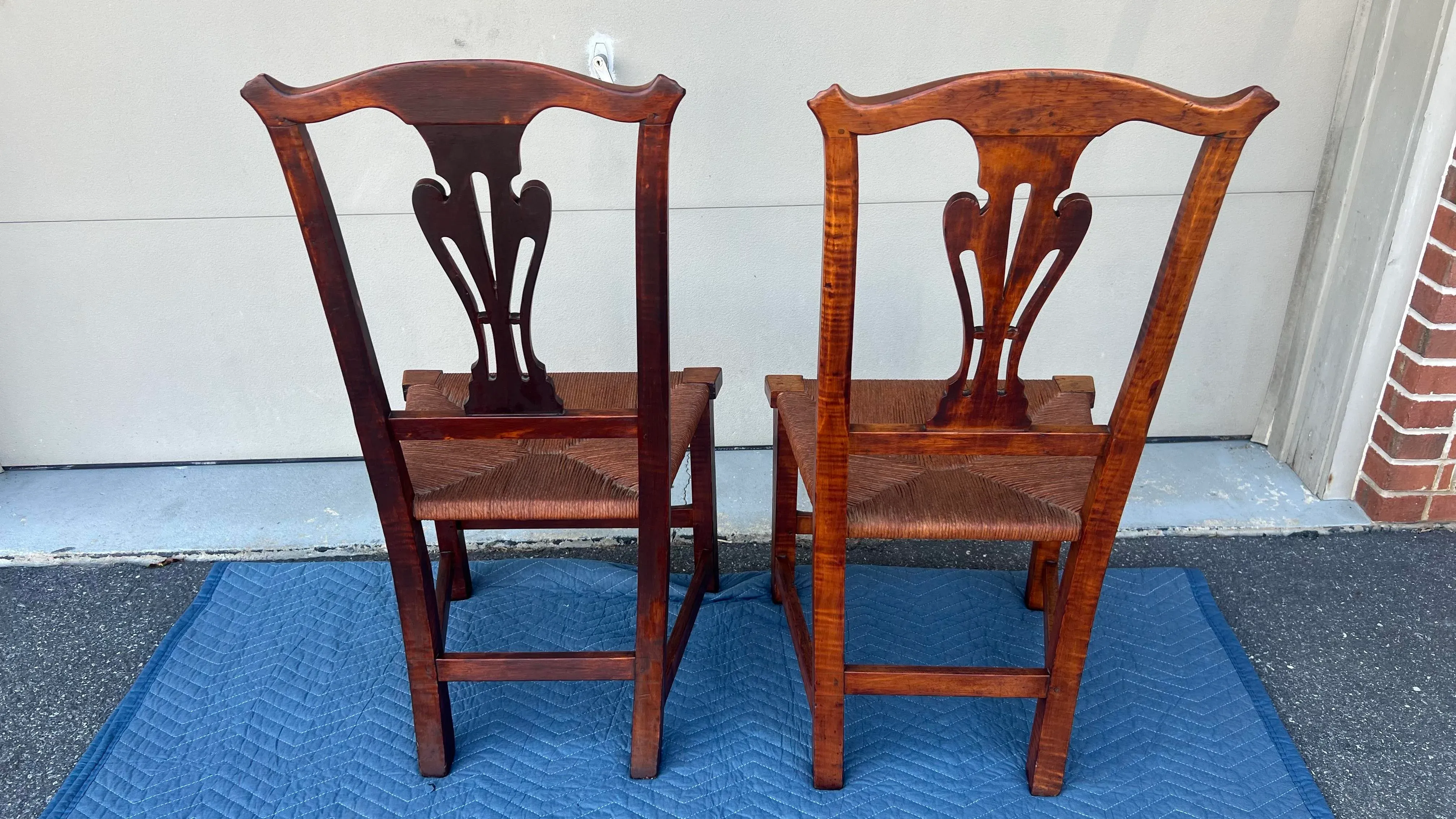 A Pair of New England Tiger Maple Chippendale Side Chairs With Rush Seats, Circa 1800