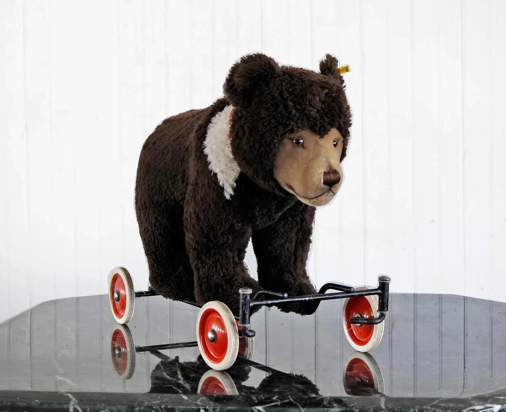 steiff-riding-bear-on-wheels-
