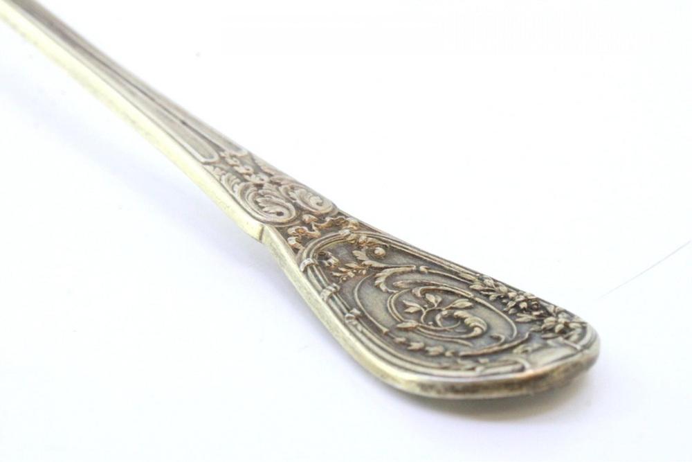 Silver Dusting Spoon with Scalloped Edges and Raised Handle