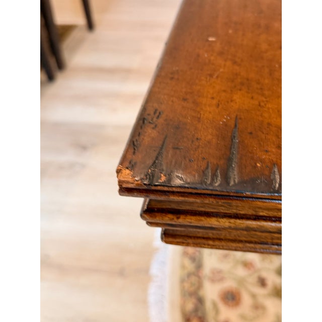 An exceptional Jonathan Charles Fine Furniture “Huntingdon” extending dining table, crafted from solid acacia wood with a...