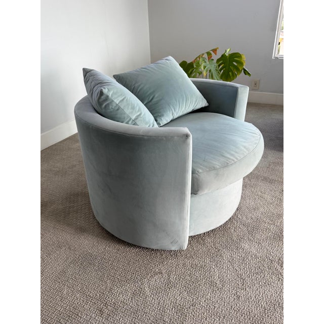 A custom Portofino swivel chair by The Joneses, handmade in Los Angeles. Upholstered in soft seafoam velvet ("Royale...