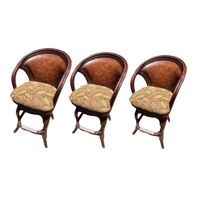 1970s Elevate Your Home Bar With This Set of 3 Premium Hooker Furniture Leather & Rattan Swivel Barstools! For Sale