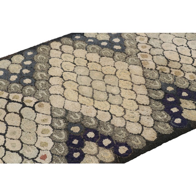 Handmade in wool and originating circa 1920-1930, this 3x5 rug is a rare and exciting new curation in Rug & Kilim’s...