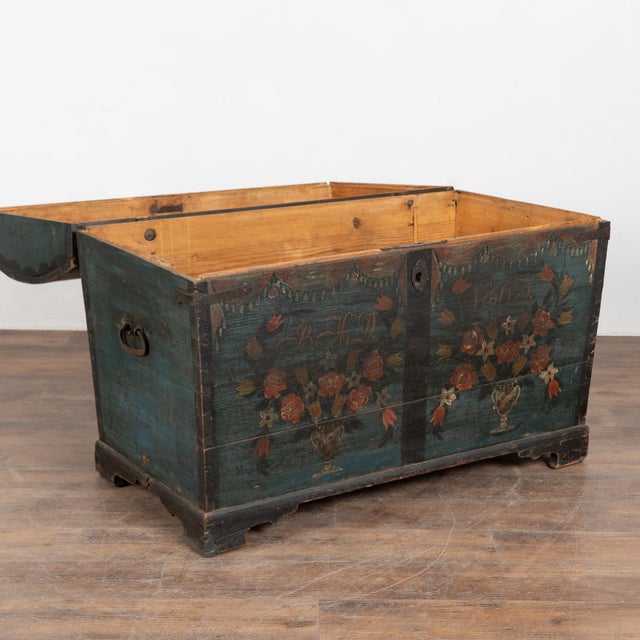 19th-century Swedish pine dome-top trunk retaining its original hand-painted finish and dated 1863. The painted surface...