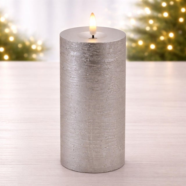 Create a warm and inviting glow in your home with this Metallic FIA Wick LED Candle set. Designed with a realistic wax...