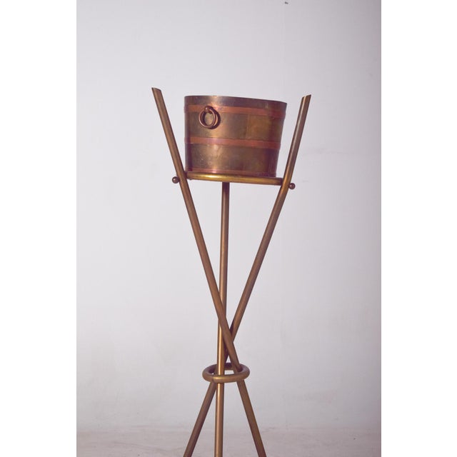 Elegant Danish planter from the 1950s, crafted in metal with a light and sophisticated design, characteristic of...