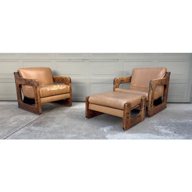 DESCRIPTION: Pair of large scale solid wood industrial, rustic sling seat lounge chairs and ottoman in the California...