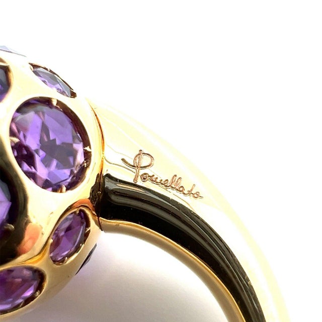 Experience the epitome of luxury and style with the Pomellato Amethyst Harem Cocktail Ring, crafted in the luscious 18k...