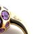 Experience the epitome of luxury and style with the Pomellato Amethyst Harem Cocktail Ring, crafted in the luscious 18k...