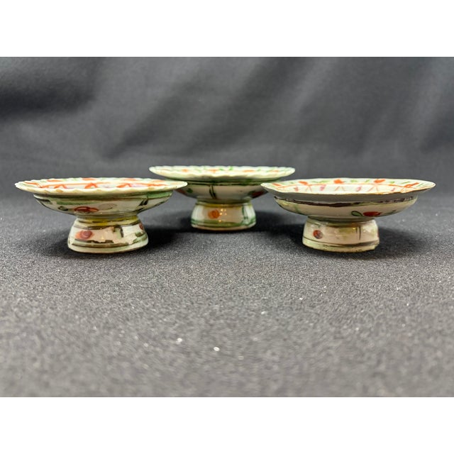 Set of three Chinese Porcelain Tazza's Footed dish, altar bowl Polychrome painted design on each. Two with scalloped...