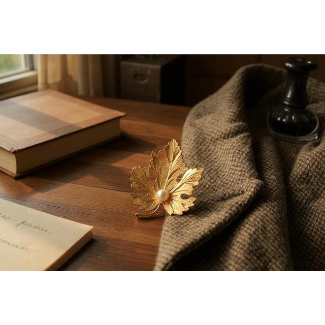 An Exquisite Blend of Nature's Beauty and Timeless Elegance Elevate your style with this enchanting 14K Yellow Gold Leaf...