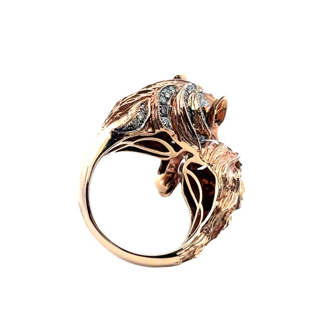 Remarkable and artistic 18k rose gold statement ring featuring an intricate horse and theatre-mask lady motif. beautifully...